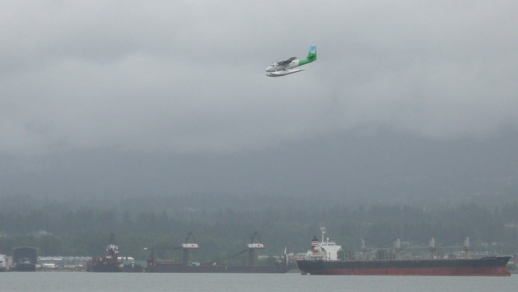 West Coast Air DHC-6 Twin Otter on approach, on a cloudy day.