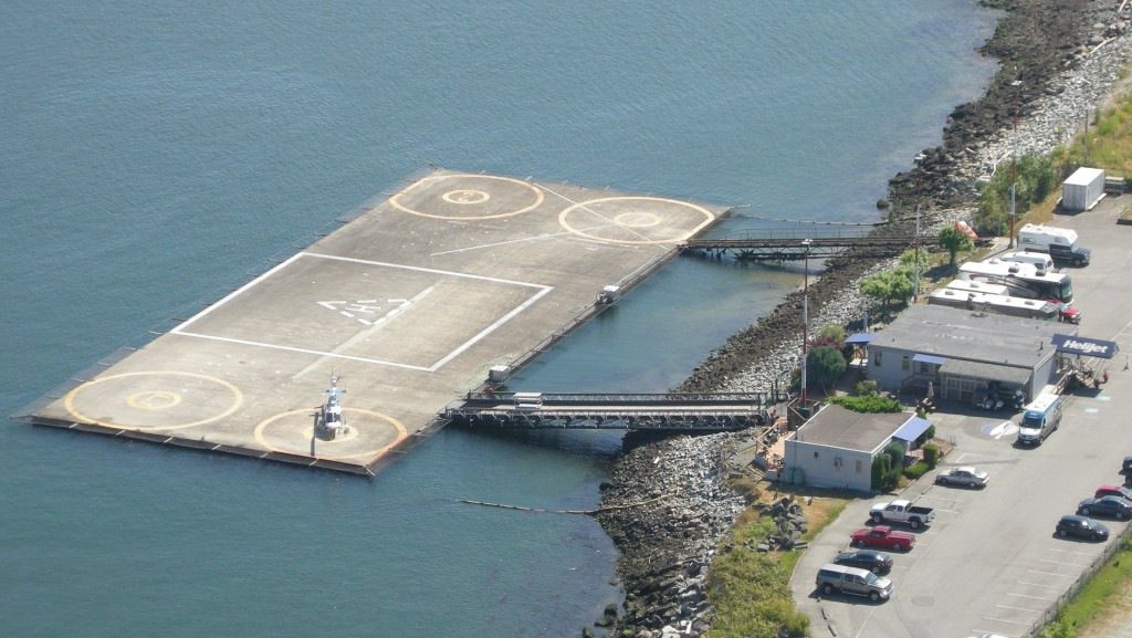 Vancouver Harbour Heliport, seen from the YHC tower. That’s a Helijet Bell LongRanger waiting to depart.