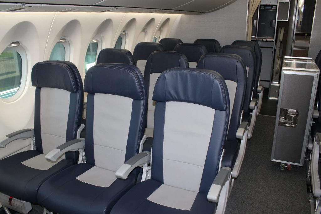 CSeries economy seating - the middle seat is wider than the others