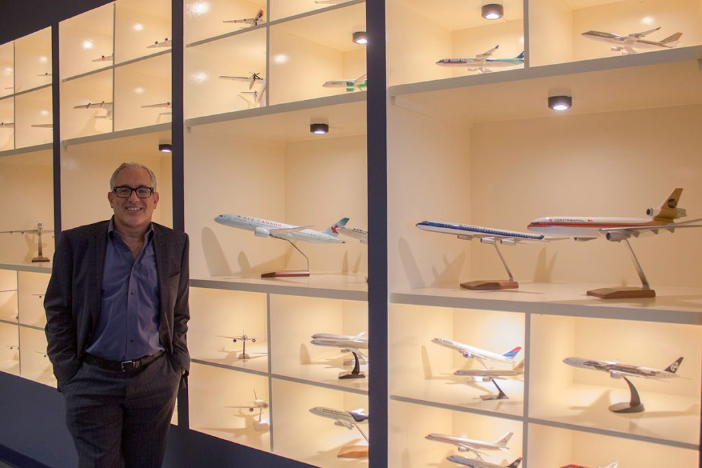 Joel Ostrov shows off his model collection. Photo: Katie Sehl