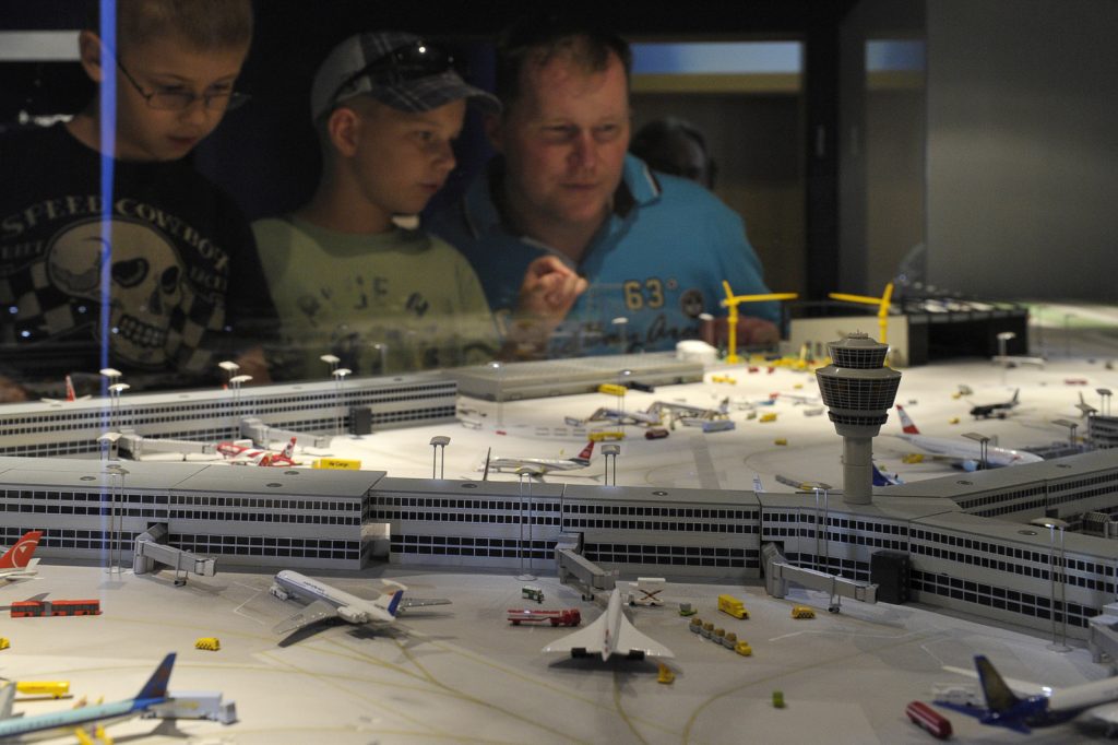 Visitors enjoy an airport model display. Photo: Herpa Wings
