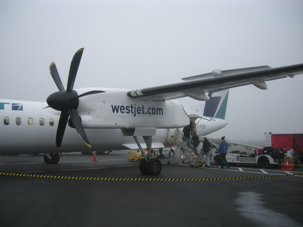 Boarding WS3102 on a foggy YVR morning.