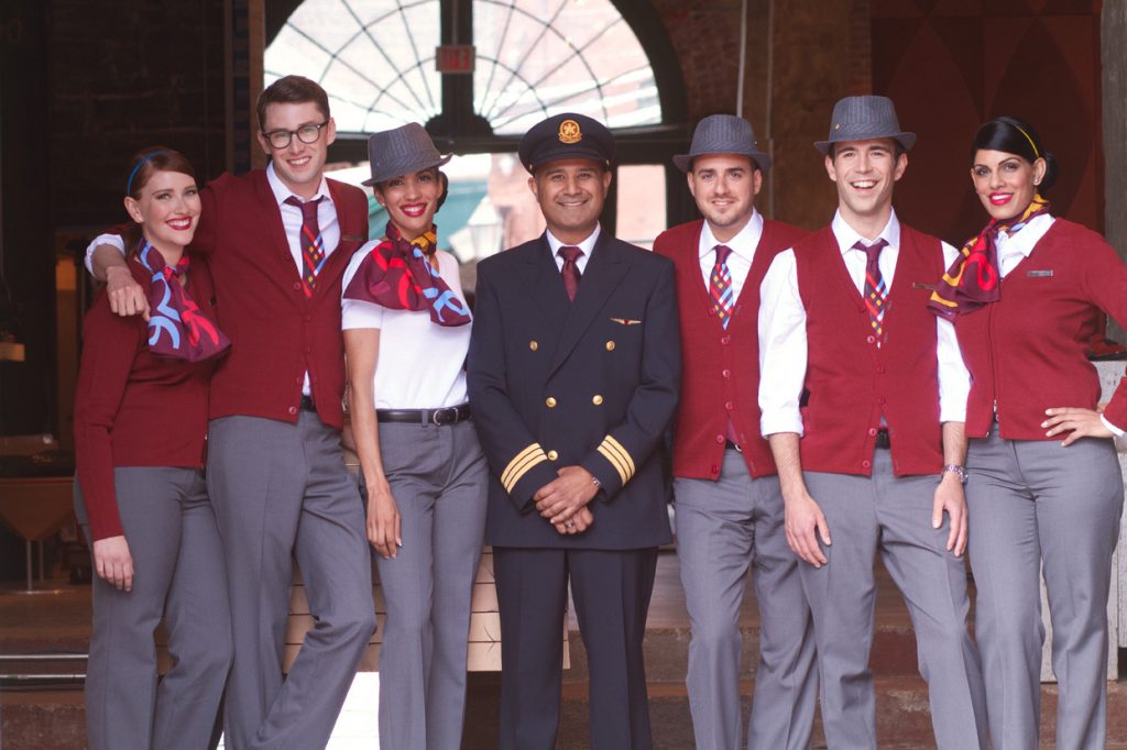 rouge flight attendants show off their new look. How about those hats?!