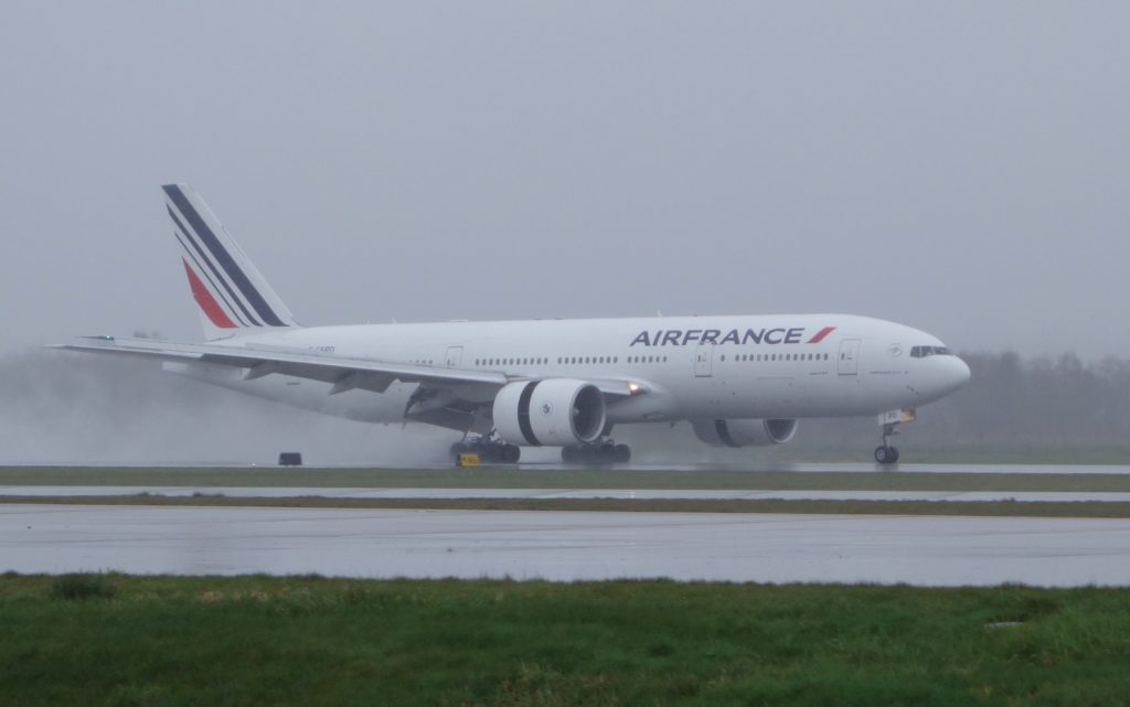 Air France's inaugural Paris to Vancouver flight touches down on YVR's Rwy 08L, just after noon on a rainy Sunday